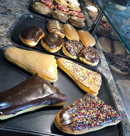 Fresh pastries and croissants in a bakery display