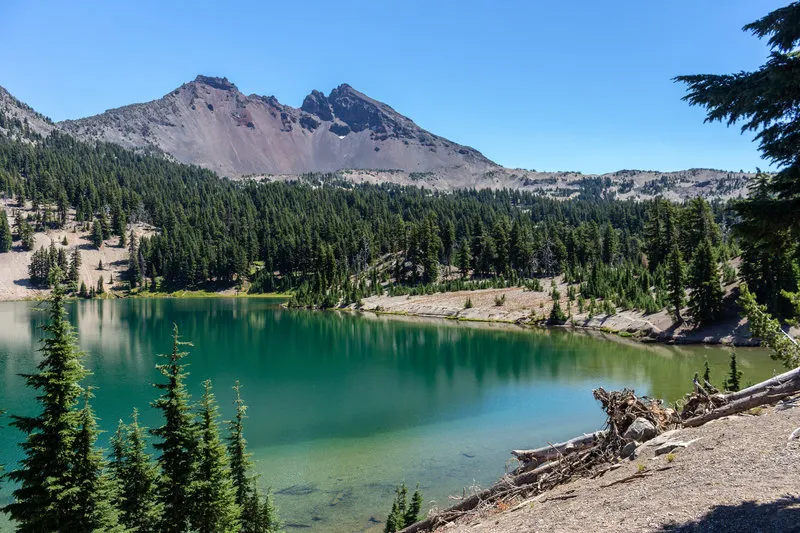 Alpine lake surrounded by mountain peaks
