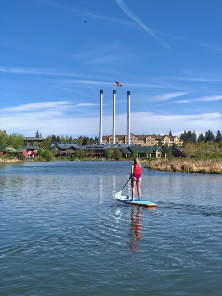 Stand-up paddleboarding on a calm lake